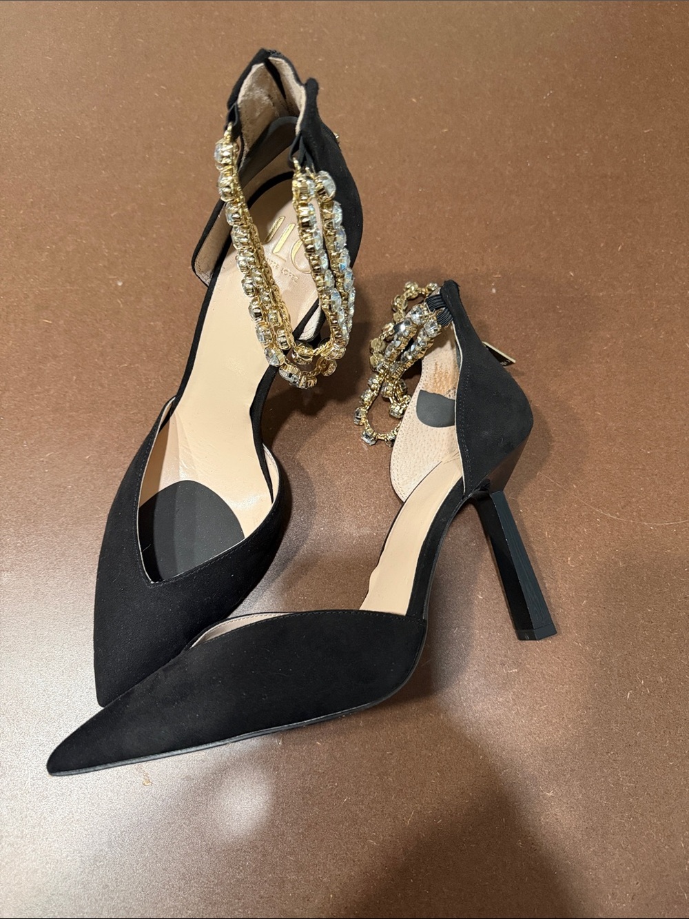 JLO Black Pointed Toe Ankle Strap Heels with Gold Chain Detail